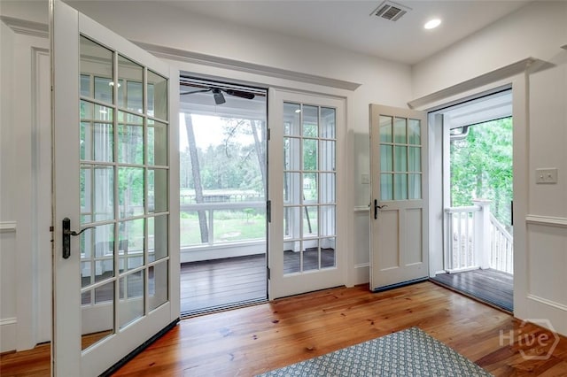 36 Belted Kingfisher Ln, Richmond Hill, GA 31324 - doorway to outside with wood finished floors, recessed lighting, and ceiling fan
