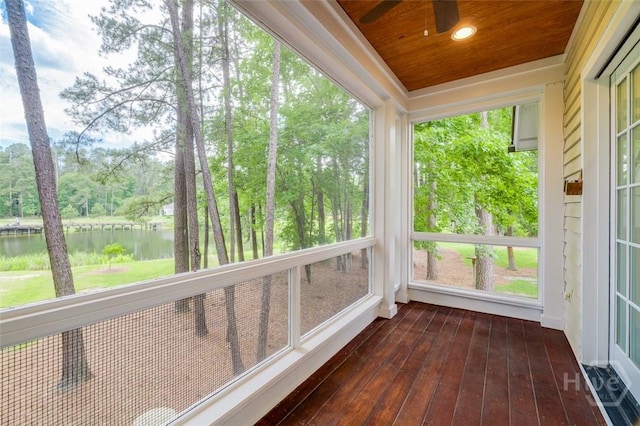 36 Belted Kingfisher Ln, Richmond Hill, GA 31324 - unfurnished sunroom featuring a water view, wooden ceiling, wood-type flooring, and view of wooded area
