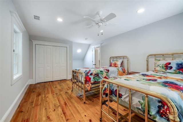 36 Belted Kingfisher Ln, Richmond Hill, GA 31324 - bedroom with light wood-type flooring, a ceiling fan, a closet, baseboards, and recessed lighting
