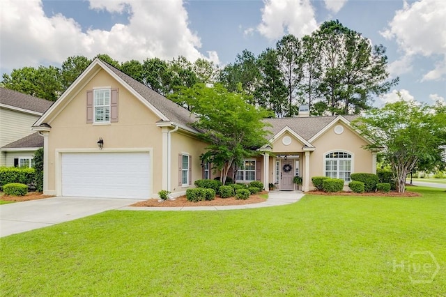 2 Iron Gate Ct, Pooler, GA 31322 - view of front of home with stucco siding, a front lawn, concrete driveway, a garage, and a chimney