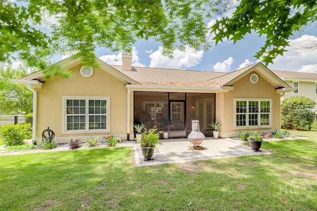 2 Iron Gate Ct, Pooler, GA 31322 - back of house with a patio, a chimney, stucco siding, and a sunroom
