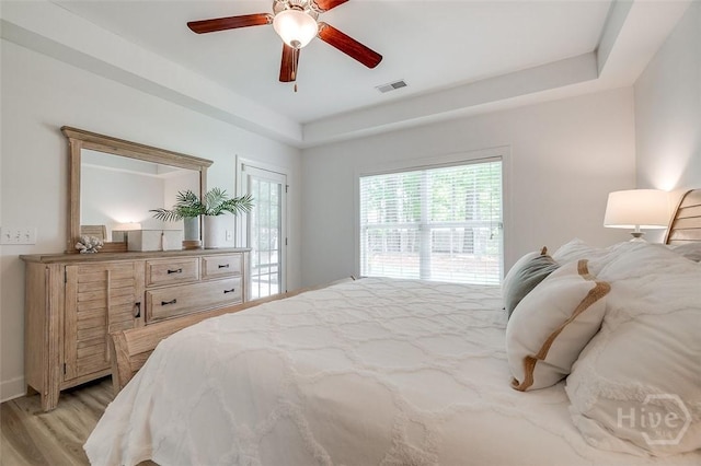 2 Iron Gate Ct, Pooler, GA 31322 - bedroom featuring light wood-type flooring, a ceiling fan, and access to exterior