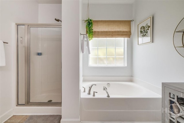 2 Iron Gate Ct, Pooler, GA 31322 - full bathroom with a shower stall, a garden tub, and tile patterned floors