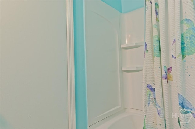 128 Deann Dr, Hinesville, GA 31313 - bathroom with shower / bath combo with shower curtain