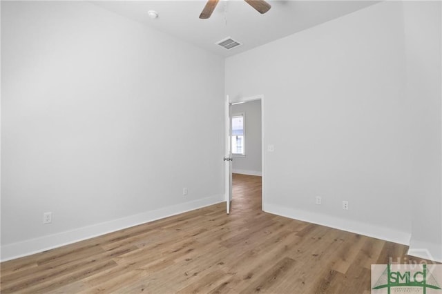 826 W Victory Dr, Savannah, GA 31405 - unfurnished room featuring ceiling fan, wood finished floors, and baseboards