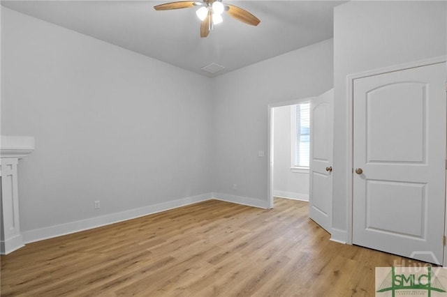 826 W Victory Dr, Savannah, GA 31405 - unfurnished bedroom with baseboards, light wood-style flooring, and ceiling fan