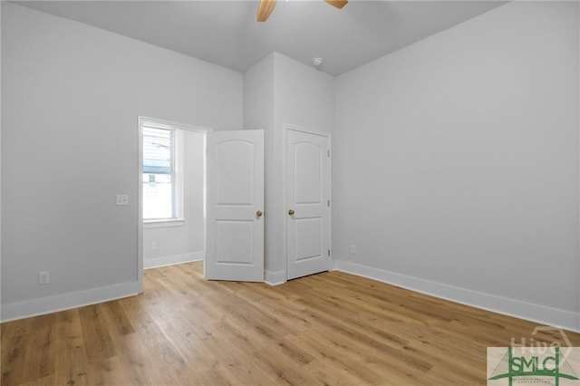 826 W Victory Dr, Savannah, GA 31405 - unfurnished bedroom with baseboards, light wood finished floors, and ceiling fan