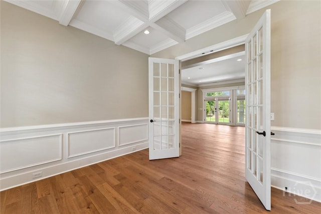 104 Post House Trl, Pooler, GA 31322 - empty room with french doors, beam ceiling, crown molding, wood finished floors, and coffered ceiling
