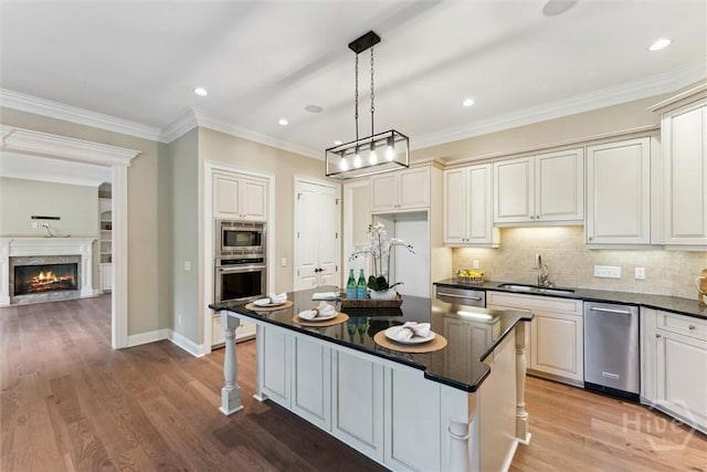 104 Post House Trl, Pooler, GA 31322 - kitchen featuring dark countertops, a sink, stainless steel appliances, tasteful backsplash, and ornamental molding