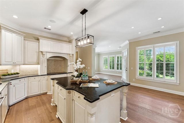 104 Post House Trl, Pooler, GA 31322 - kitchen featuring light wood-style floors, recessed lighting, crown molding, pendant lighting, and a kitchen island