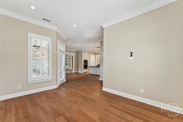 104 Post House Trl, Pooler, GA 31322 - unfurnished living room with recessed lighting, baseboards, wood finished floors, and ornamental molding