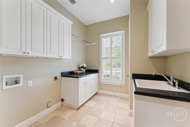 104 Post House Trl, Pooler, GA 31322 - laundry area with cabinet space, hookup for an electric dryer, baseboards, and washer hookup