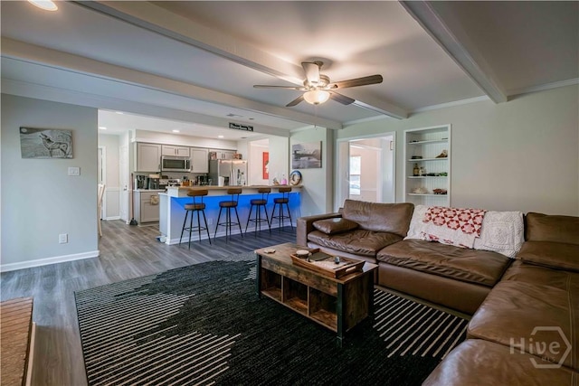 3 Black Forest Dr, Savannah, GA 31410 - living room with wood finished floors, a ceiling fan, beamed ceiling, and baseboards
