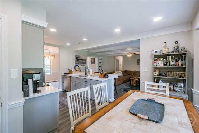 3 Black Forest Dr, Savannah, GA 31410 - kitchen featuring a sink, light countertops, stainless steel dishwasher, wood finished floors, and recessed lighting