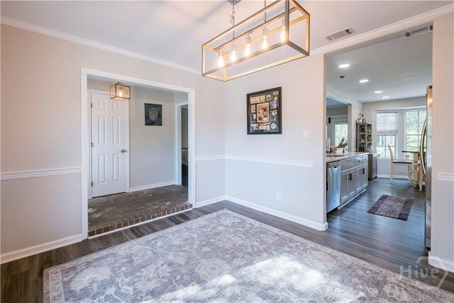 3 Black Forest Dr, Savannah, GA 31410 - foyer entrance with dark wood finished floors, baseboards, crown molding, and recessed lighting
