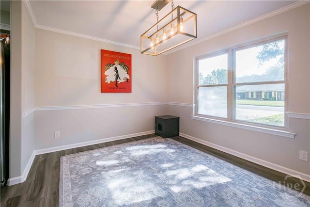 3 Black Forest Dr, Savannah, GA 31410 - spare room with dark wood-type flooring, a chandelier, ornamental molding, and baseboards