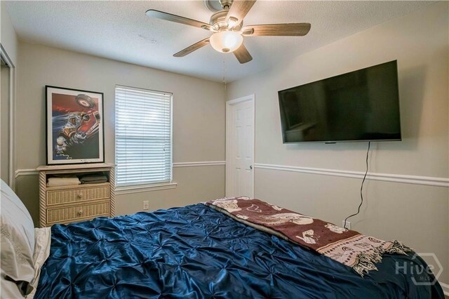 3 Black Forest Dr, Savannah, GA 31410 - bedroom featuring a ceiling fan and a textured ceiling