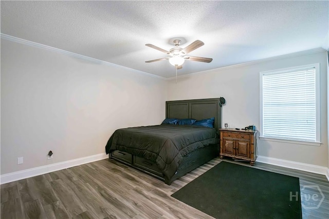 3 Black Forest Dr, Savannah, GA 31410 - bedroom featuring dark wood-type flooring, baseboards, ornamental molding, a textured ceiling, and a ceiling fan