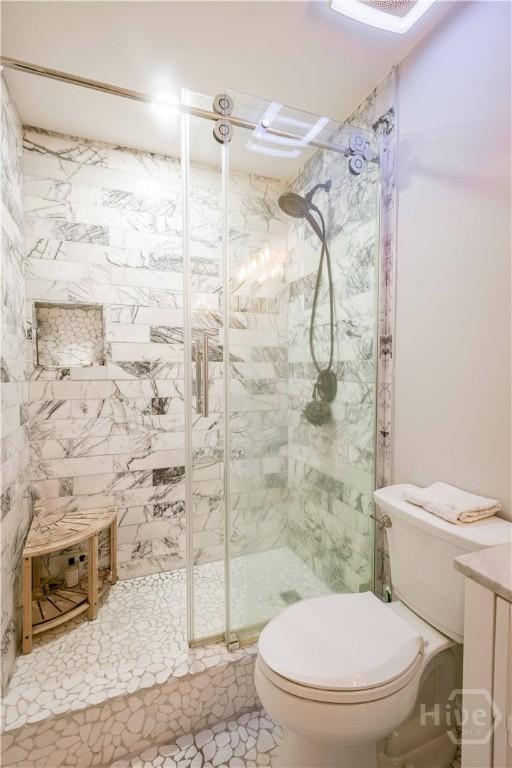 3 Black Forest Dr, Savannah, GA 31410 - bathroom featuring a stall shower and toilet