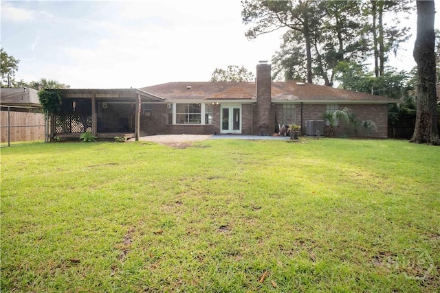 3 Black Forest Dr, Savannah, GA 31410 - rear view of property featuring french doors, central AC, a patio, and a chimney
