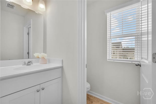142 Benelli Dr, Pooler, GA 31322 - bathroom featuring vanity, toilet, and baseboards