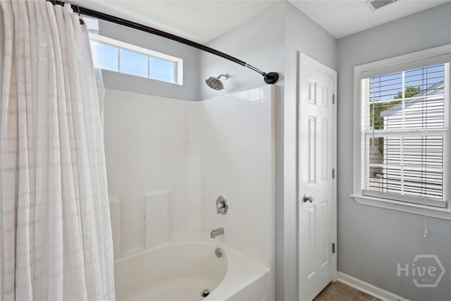 43 Godley Park Way, Savannah, GA 31407 - bathroom with shower / tub combo, healthy amount of natural light, and baseboards