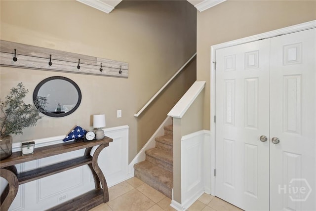 43 Godley Park Way, Savannah, GA 31407 - foyer entrance with stairway, light tile patterned flooring, and ornamental molding