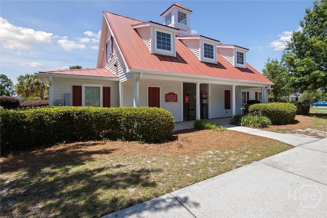 43 Godley Park Way, Savannah, GA 31407 - cape cod house with a porch, metal roof, and a front lawn