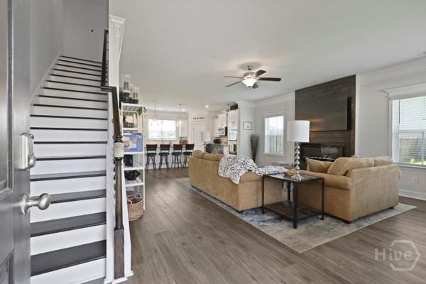 150 Pitch Point Trl, Richmond Hill, GA 31324 - living room with a ceiling fan, plenty of natural light, and wood finished floors