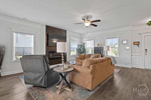 150 Pitch Point Trl, Richmond Hill, GA 31324 - living area with a ceiling fan, dark wood-type flooring, baseboards, ornamental molding, and a fireplace
