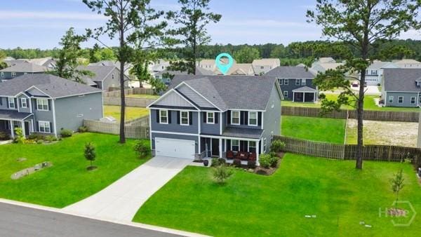 150 Pitch Point Trl, Richmond Hill, GA 31324 - traditional-style house featuring a residential view, a garage, and driveway