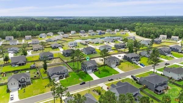 150 Pitch Point Trl, Richmond Hill, GA 31324 - aerial perspective of suburban area with a forest