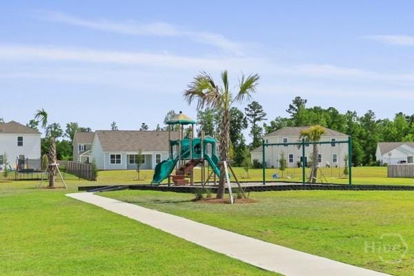 150 Pitch Point Trl, Richmond Hill, GA 31324 - communal playground featuring a yard