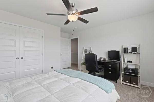 150 Pitch Point Trl, Richmond Hill, GA 31324 - carpeted bedroom with a closet, baseboards, and a ceiling fan