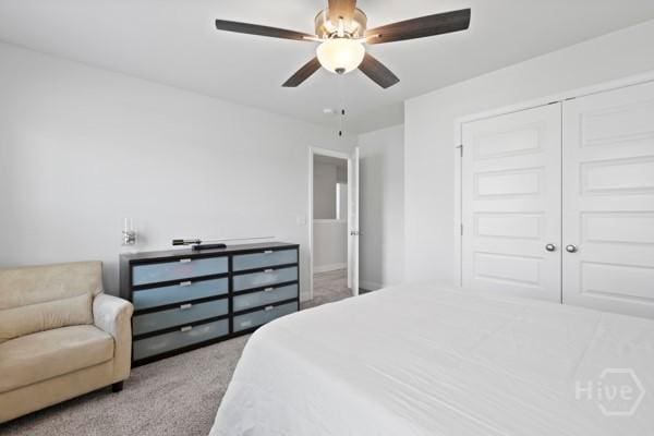 150 Pitch Point Trl, Richmond Hill, GA 31324 - bedroom featuring carpet flooring, a closet, and a ceiling fan