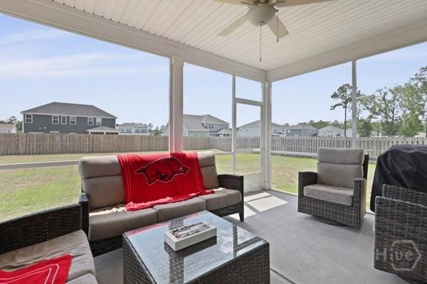 150 Pitch Point Trl, Richmond Hill, GA 31324 - sunroom / solarium with ceiling fan, an outdoor hangout area, and a residential view