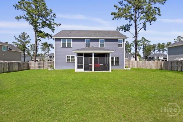 150 Pitch Point Trl, Richmond Hill, GA 31324 - rear view of property with a sunroom
