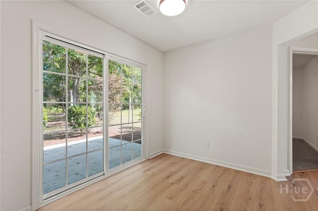 210 Walker Dr, Guyton, GA 31312 - spare room with light wood finished floors and baseboards
