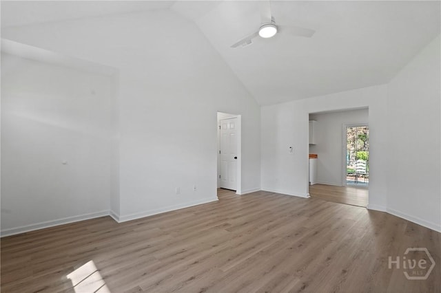 210 Walker Dr, Guyton, GA 31312 - empty room with a ceiling fan, high vaulted ceiling, wood finished floors, and baseboards