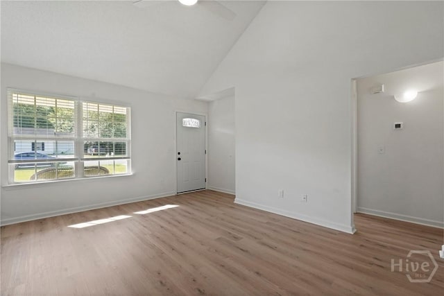 210 Walker Dr, Guyton, GA 31312 - entryway with wood finished floors, a ceiling fan, baseboards, and high vaulted ceiling