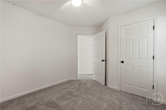 210 Walker Dr, Guyton, GA 31312 - unfurnished bedroom with carpet, baseboards, and ceiling fan