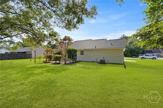 210 Walker Dr, Guyton, GA 31312 - rear view of house featuring central AC