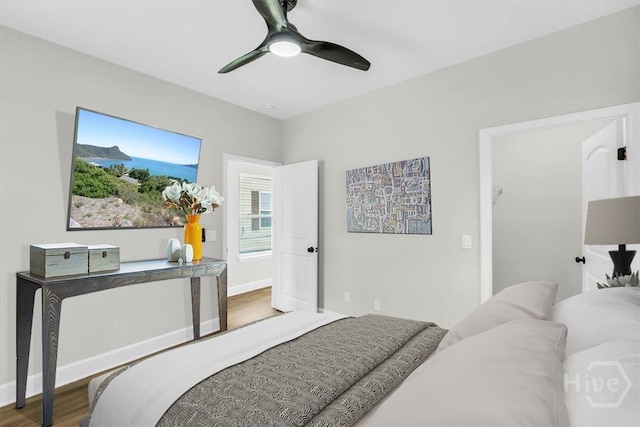 716 Waters Ave, Savannah, GA 31404 - bedroom featuring wood finished floors, baseboards, and ceiling fan