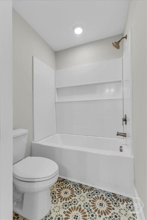 716 Waters Ave, Savannah, GA 31404 - bathroom featuring toilet, bathing tub / shower combination, and tile patterned floors