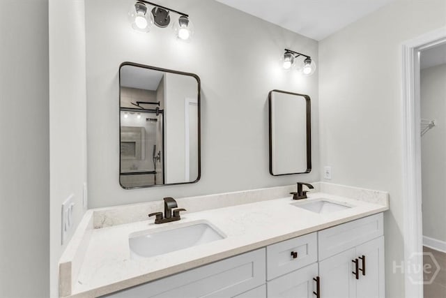 716 Waters Ave, Savannah, GA 31404 - bathroom with double vanity and a shower