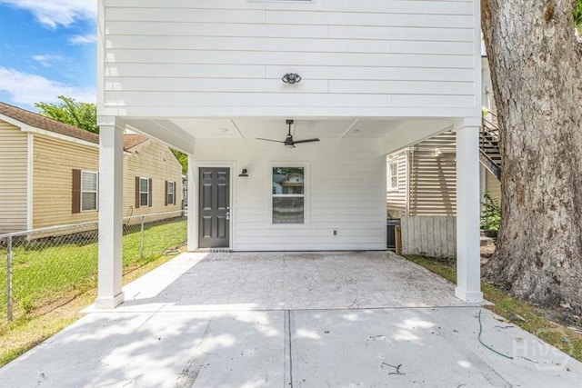 716 Waters Ave, Savannah, GA 31404 - view of patio with a carport, driveway, and a ceiling fan
