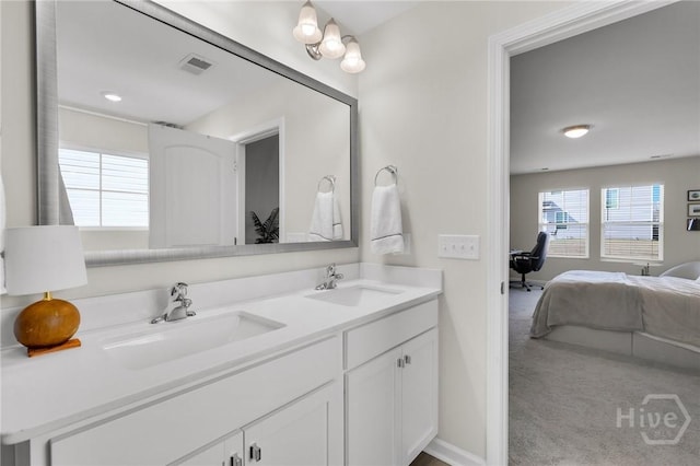 22 Stetson Dr, Savannah, GA 31419 - bathroom featuring ensuite bath, double vanity, and baseboards