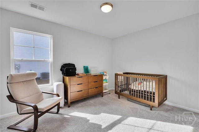 22 Stetson Dr, Savannah, GA 31419 - bedroom featuring baseboards, carpet flooring, and a nursery area