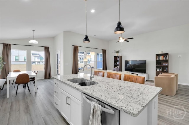22 Stetson Dr, Savannah, GA 31419 - kitchen featuring a sink, stainless steel dishwasher, light wood-type flooring, a kitchen island with sink, and white cabinetry