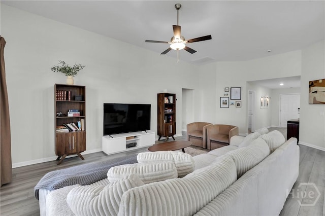 22 Stetson Dr, Savannah, GA 31419 - living room with wood finished floors, a ceiling fan, and baseboards